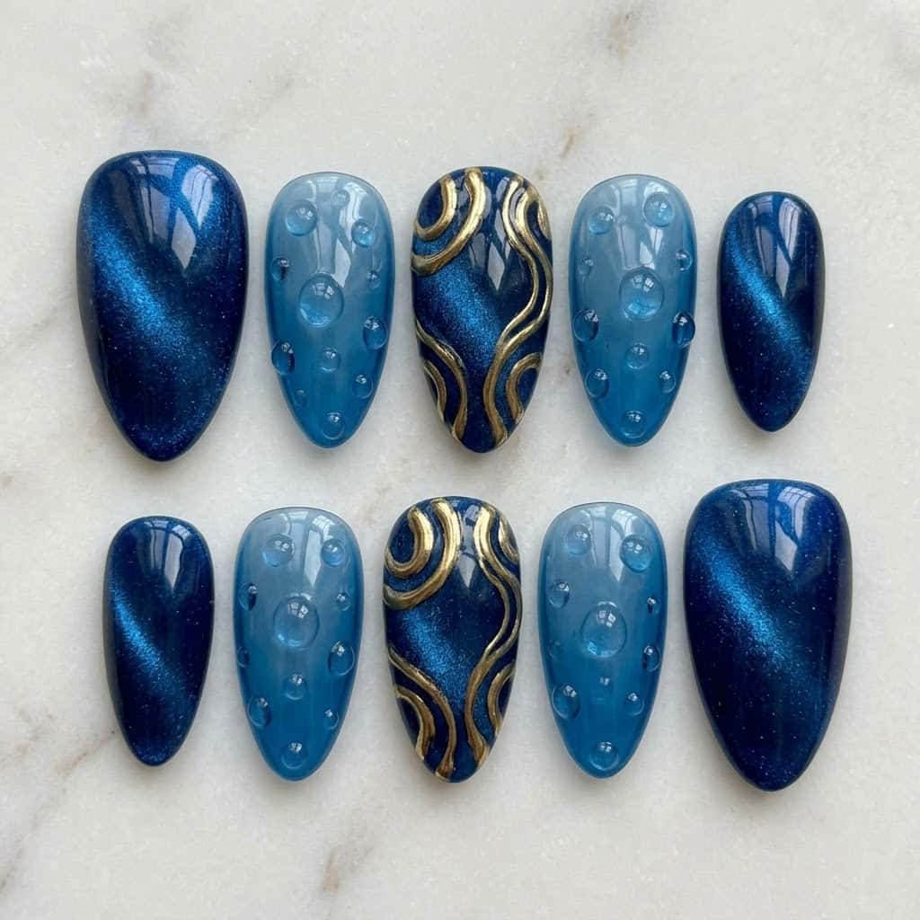 Blue cat eye nails, ten almond nails in two mirrored rows