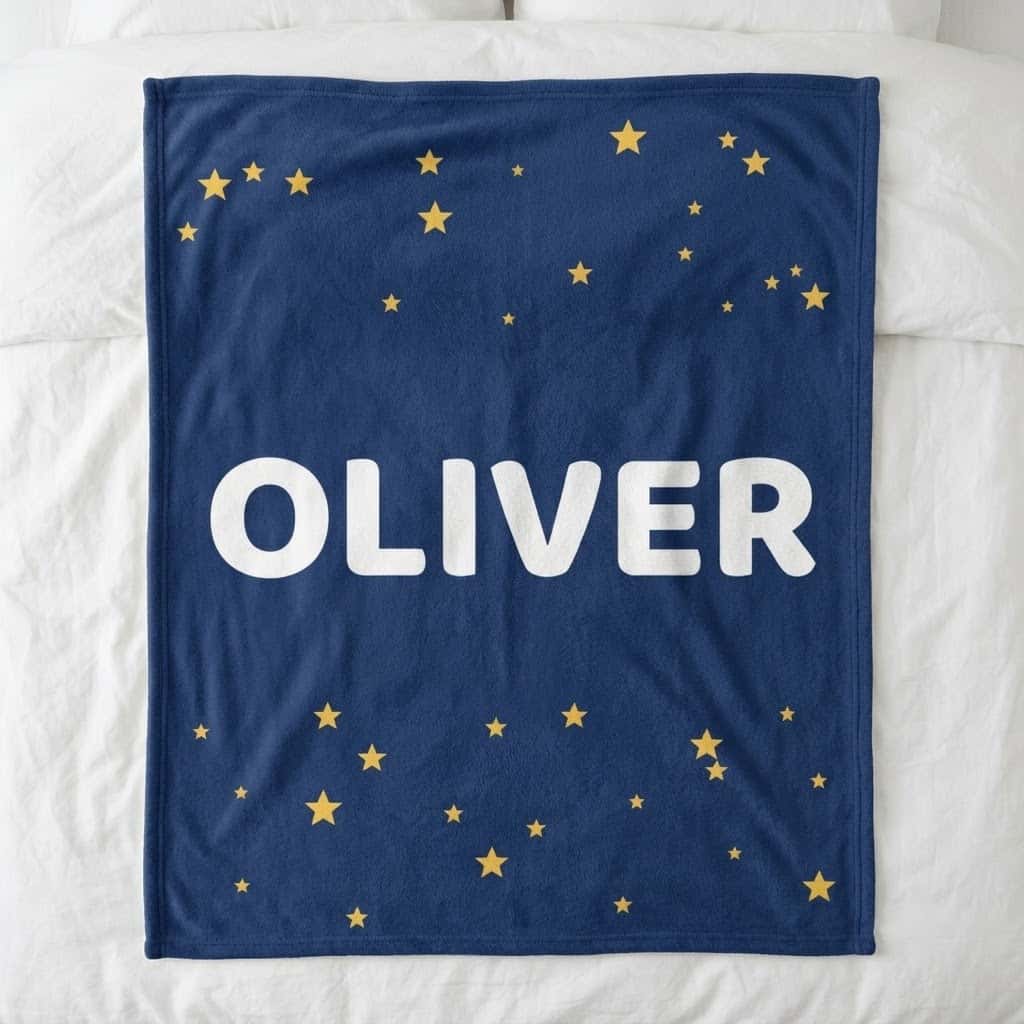 Personalized kids name blanket with big OLIVER name and gold stars on navy