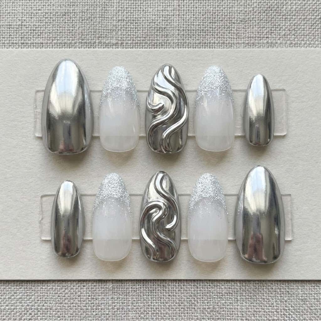 Silver chrome nails, ten almond nails in two mirrored rows