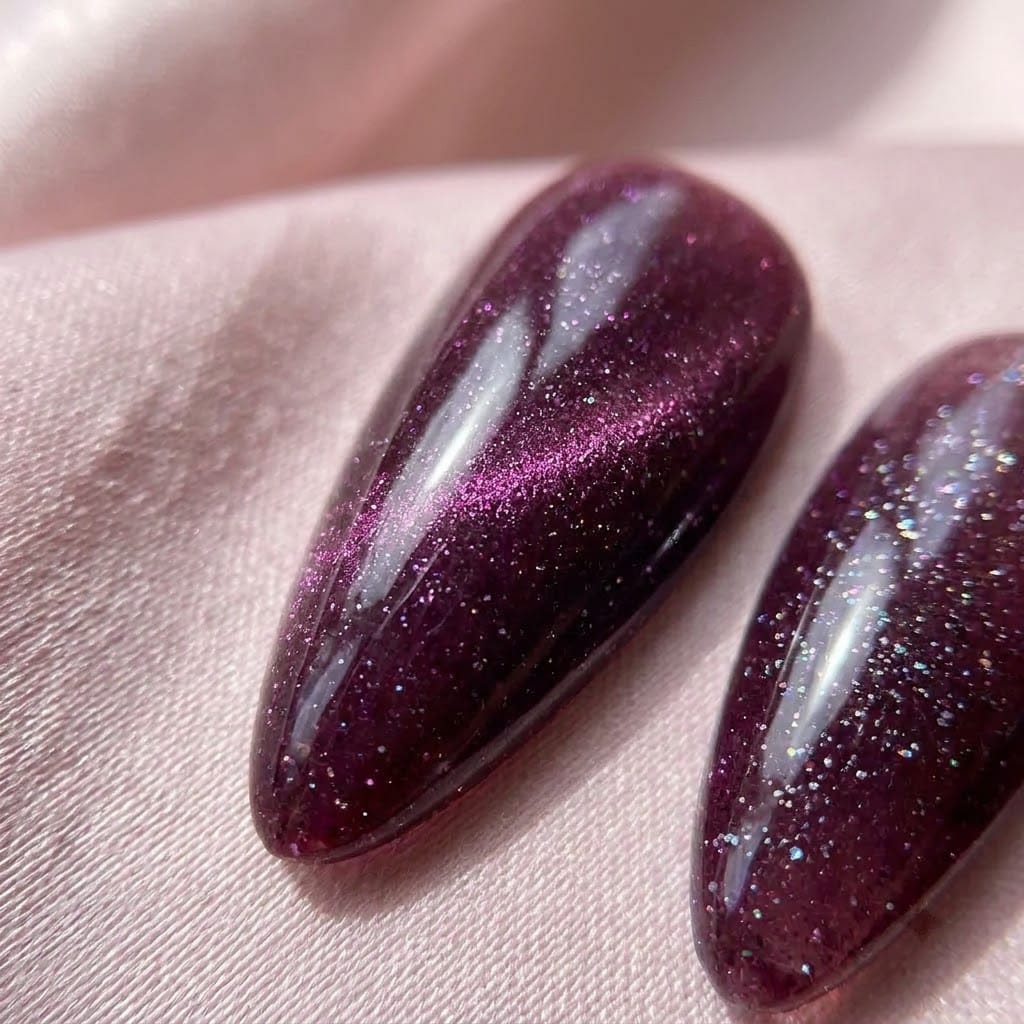 Close-up of the hero glitter cat eye nail with 3D detail
