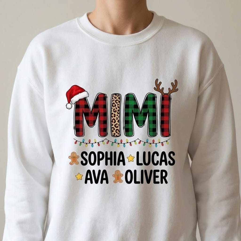 Woman wearing a white sweatshirt with plaid MIMI letters, Santa hat and antlers